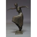 An Art Deco style bronze figure, modelled as a dancing girl, in the style of Demetre Chiparus,
