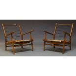 Scandart Ltd, a pair of teak and beech lounge armchairs, c.1960, with applied manufacturer's label