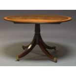 A George III style mahogany and crossbanded breakfast table, late 20th Century, with oval top on