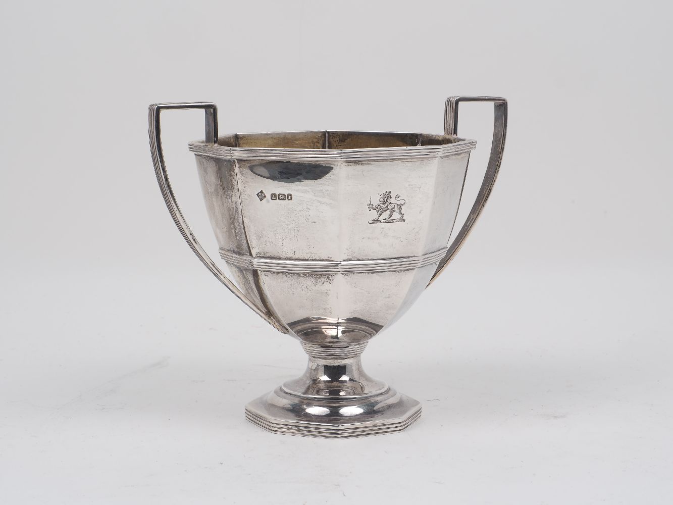 A twin handled silver dish, Sheffield, c.1895, Martin, Hall & Co., the octagonal body with