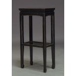 AMENDMENT: Please note VAT is charged on the hammer price for this Lot. An ebonised and two-tier