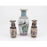 A 20th century Chinese famille rose vase of baluster form, decorated with pheasants and floral