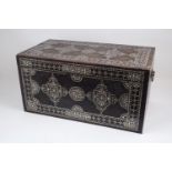 A small hardwood chest inlaid with mother of pearl, 19th century, the inlay of triangular form parts