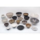 A large collection of 20th / 21st century Korean and Japanese stoneware bowls of conical form
