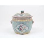 A Chinese famille rose pot and cover, 19th Century, of blue and yellow ground decorated with a