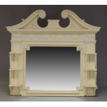 A Victorian white painted overmantle mirror, with swan neck pediment, above frieze decorated with