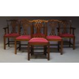 A set of six George II style mahogany dining chairs, late 20th Century, with serpentine top rails