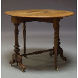 A Victorian walnut and inlaid Sutherland table, the oval top, with two drop leaves, on carved