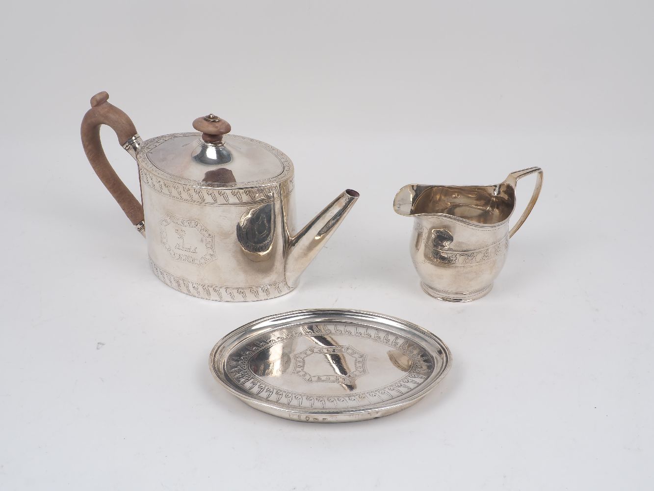 A George III silver oval teapot and stand, London, c.1790, Henry Chawner, together with a silver