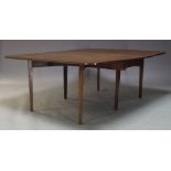 A George III mahogany dining table, the rounded rectangular top with two drop leaves, raised on