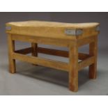 A beech butcher's block, late 20th Century, the rectangular block, on pine stand with square