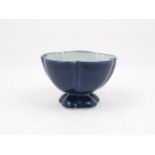 A blue glazed lobed bowl, probably Chinese, late 20th century, 10.8cm high, 18.5cm diameterPlease
