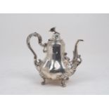 A nineteenth century French silver coffee pot by Martial Fray, Paris, c.1850, the lobed body