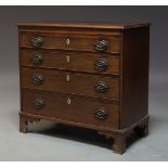 A Regency mahogany chest of drawers, with brushing slide over four long graduated drawers raised
