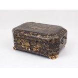 A Chinese lacquered and gilded wooden sewing box, 19th/20th century, of elongated octagonal form,
