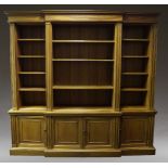 A George III style mahogany breakfront bookcase, late 20th Century, the moulded cornice above