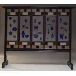 A Chinese glass and ebonised screen, made up of five (possible late 19th century) blue, red and