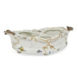 A Meissen porcelain boat shape condiment tray, 18th century, with moulded decoration of flowers