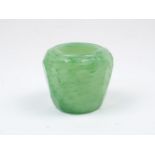 A Chinese Peking glass brush water pot of mottled green colour, imitating jadeite, with faceted
