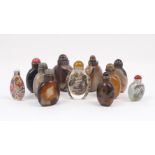 A group of hardstone and painted snuff bottles, to include an example with landscape decorative