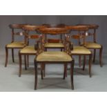A set of six Regency and later mahogany bar back dining chairs, the bar rails with carved