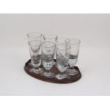 A group of drinking glasses, 19th century of inverted conical form, each upon spreading foot,