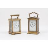 A French carriage clock, of typical form, the white dial, with black Roman numerals and batons,