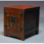 A Chinese red lacquered low cabinet, 20th Century, with overall gilt decoration with figural scenes,