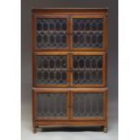 A Minty mahogany and glazed three section bookcase, early 20th Century, with three sets of glazed