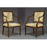 A pair of George III mahogany and painted armchairs, in the Sheraton taste, the square backrests