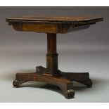 A Regency rosewood and brass inlaid card table, the fold over top, enclosing blue baize lined