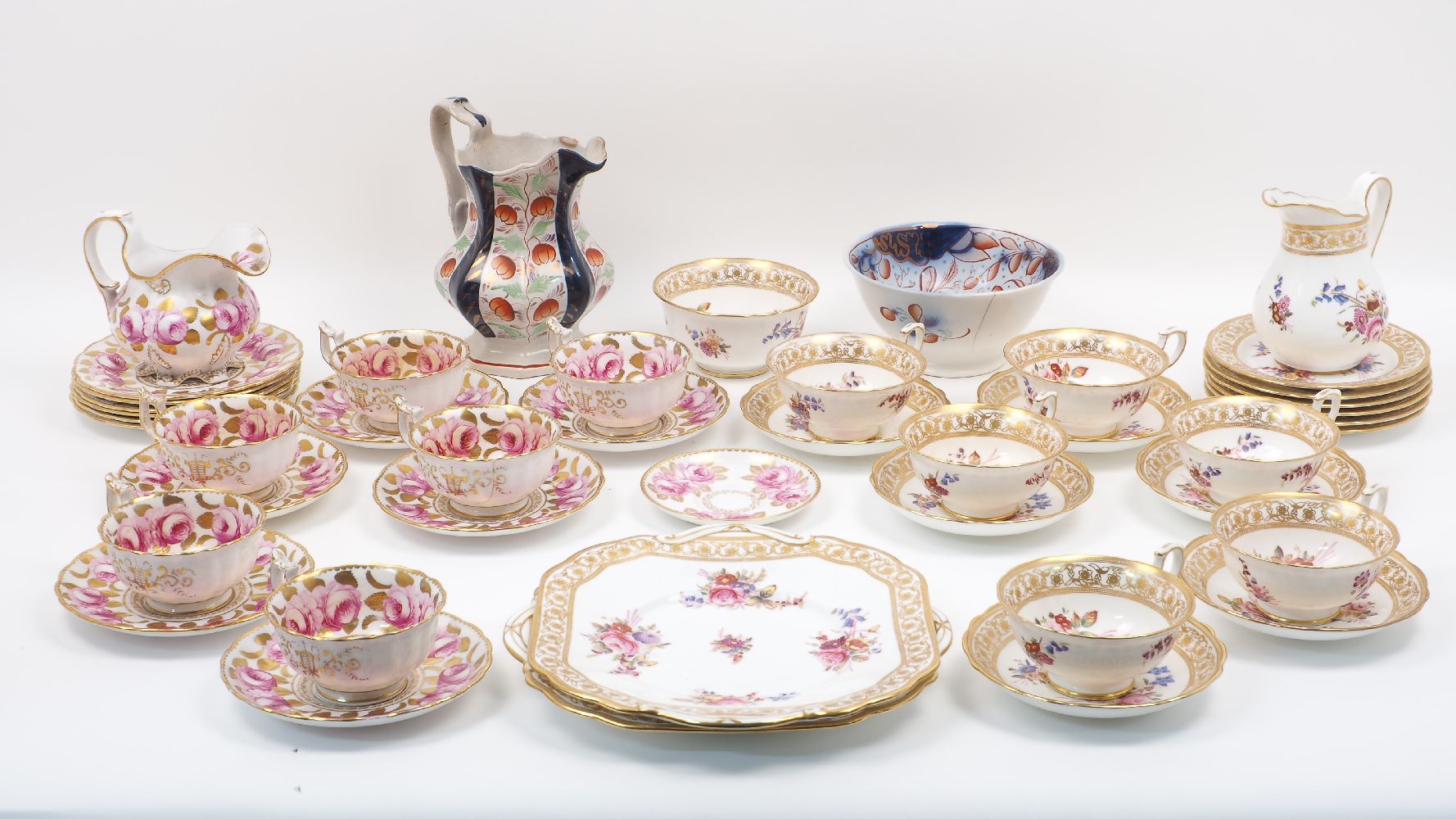 A part tea set by Cammersley & Co. to include 6 teacups and saucers, 6 bowls, a milk jug and a