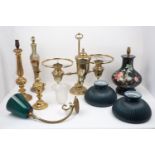 A selection of table lamps, to include, a Rococo style gilt wood example, with foliate designs,