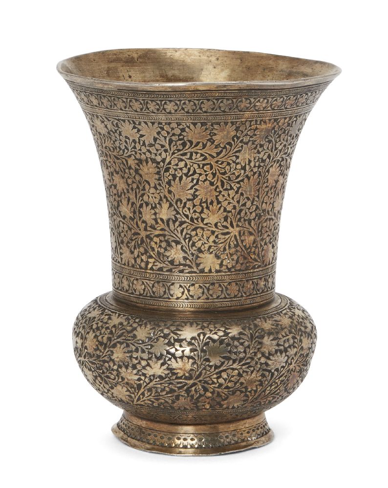 A silver gilt beaker, Kashmir, North India, late 19th century, on a short foot with rounded base