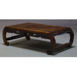 A Chinese rosewood low table, 19th Century, the rectangular top above pierced frieze on curved