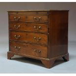 A George III mahogany chest of drawers, with brushing slide and four long graduated drawers,