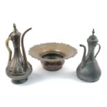 An Islamic copper jug and associated basin, 18th/19th century with additions, together with a
