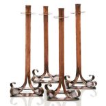 Arts and Crafts (British), a set of candlesticks c. 1900, unsigned A set of four tall copper