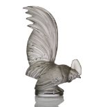 René Lalique (1860-1945), a clear and frosted glass paper-weight ‘Coq Nain’ No. 11-800, designed