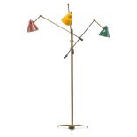 Italian, a brass three light standard lamp, In the manner of Stilnovo c.1950 With three enamelled