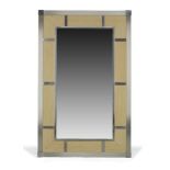 Italian, a brushed steel and travertine wall mirror c.1980 Of rectangular form with brushed steel