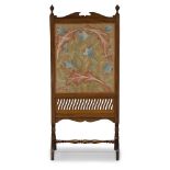 Morris & Co (1875-1940), a mahogany, linen and silk embroidered fire screen Late 19th Century,