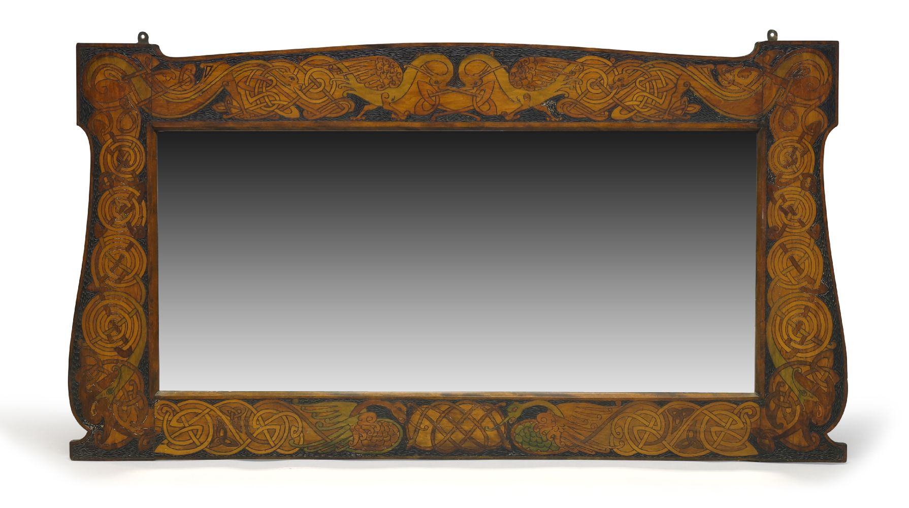 William Rodman & Co, an Irish Arts and Crafts poker work mirror c.1900, paper label on reverse for