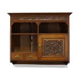 Arthur W. Simpson (1857-1922), an Arts and Crafts carved oak hanging cupboard c.1908, signed on