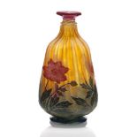 Daum, a cameo glass bottle with flower form stopper c.1902, engraved Daum Nancy with Cross of