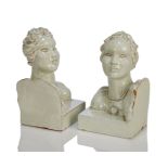 A pair of glazed terracotta bookends, possibly Austrian and in the style of the Wiener Werkstatte