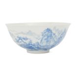 A Chinese porcelain bowl, late Republic period, painted in blue enamel with an expansive mountainous