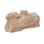 A Chinese grey pottery zoomorphic vessel, Han dynasty, modelled as a recumbent ram with traces of