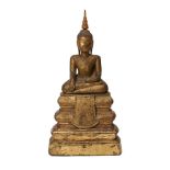 A Cambodian gilded wood seated Buddha, 19th century, 31cm high Provenance: Private German