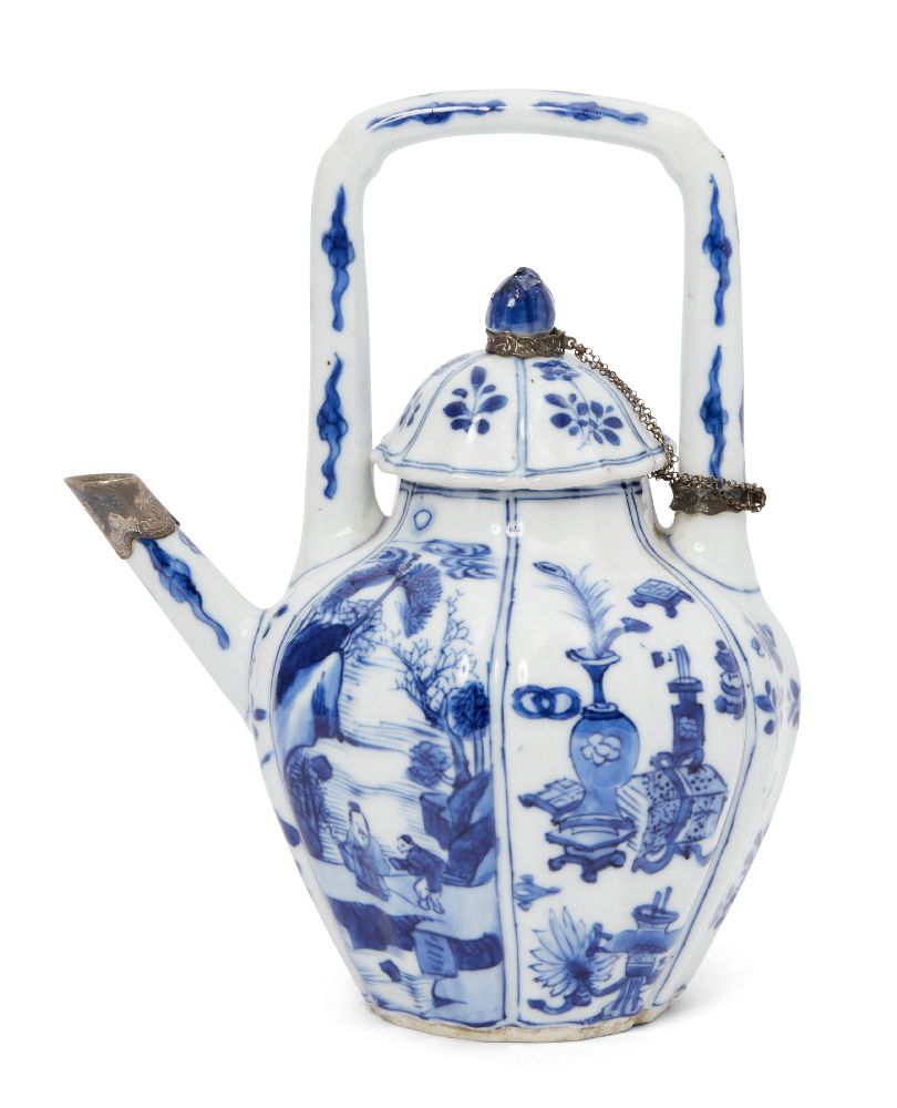 A Chinese porcelain hexagonal wine pot, Kangxi period, painted in underglaze blue to the lobed